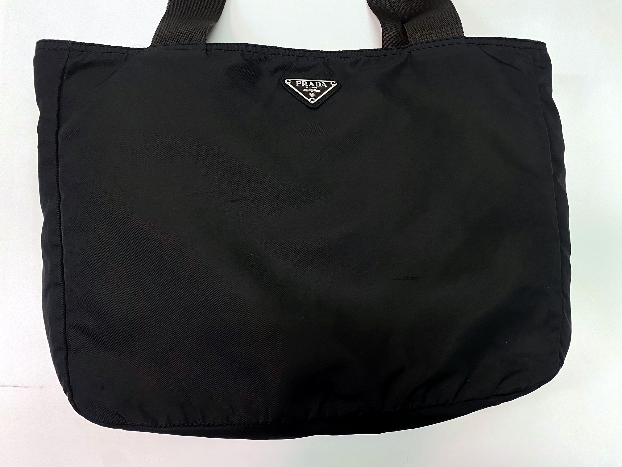 プラダのナイロン素材のバッグの色褪せ変色　色修正ご相談下さい！全国宅配便にてOK!|愛知洗い人｜愛知県染み抜きのできるクリーニング店紹介サイト